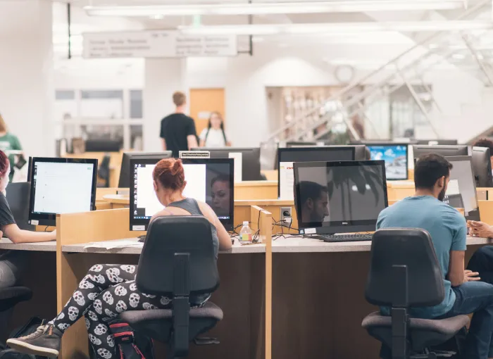 El Kraemer Library showing students working on computers