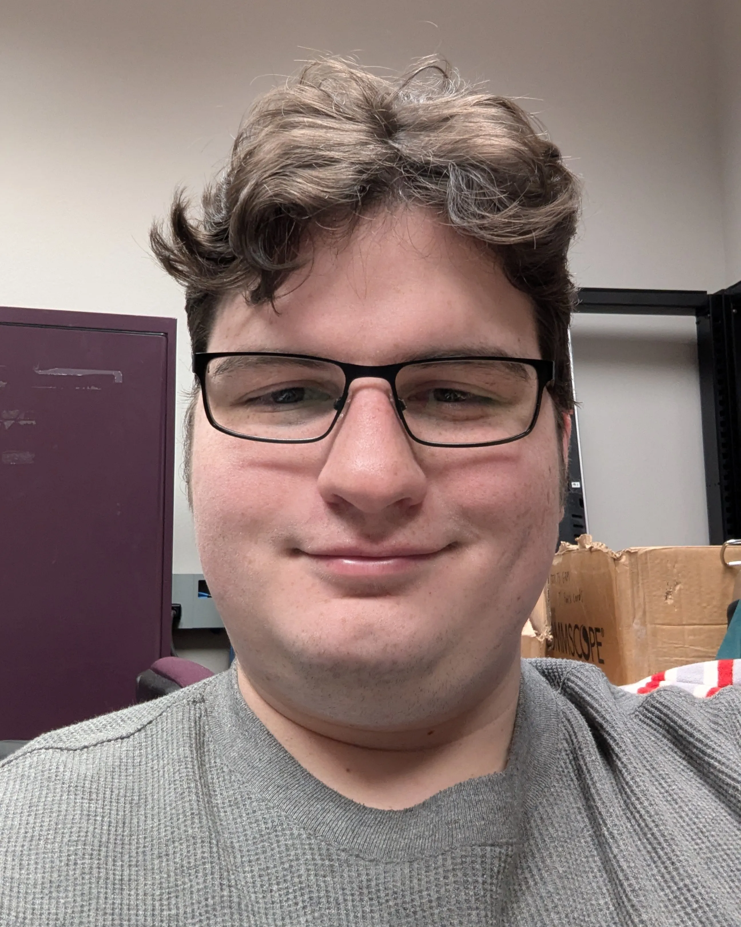 Headshot of David Jones smiling.