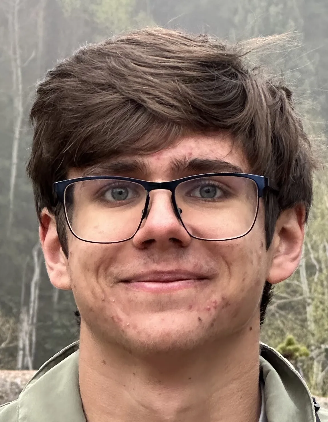 Headshot of Evan Futey smiling.