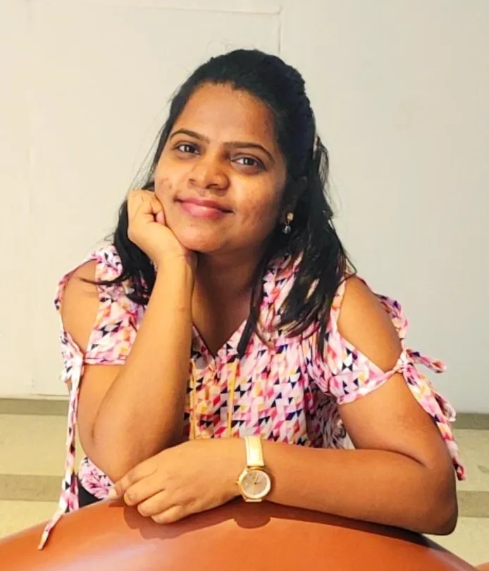 Headshot of Neeta Kannu smiling.